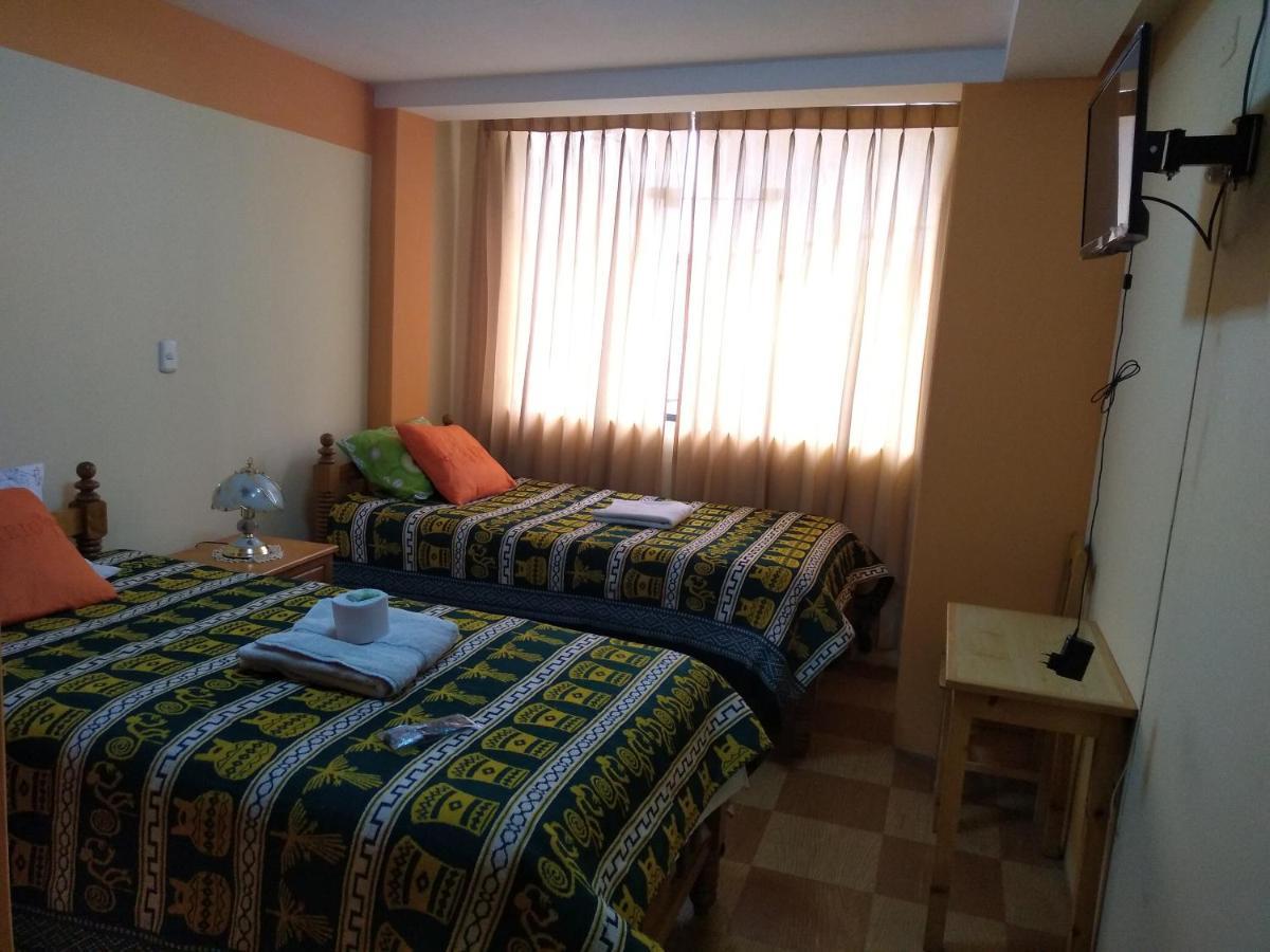 Hostal Vista Al Lago Titicaca Puno Esterno foto