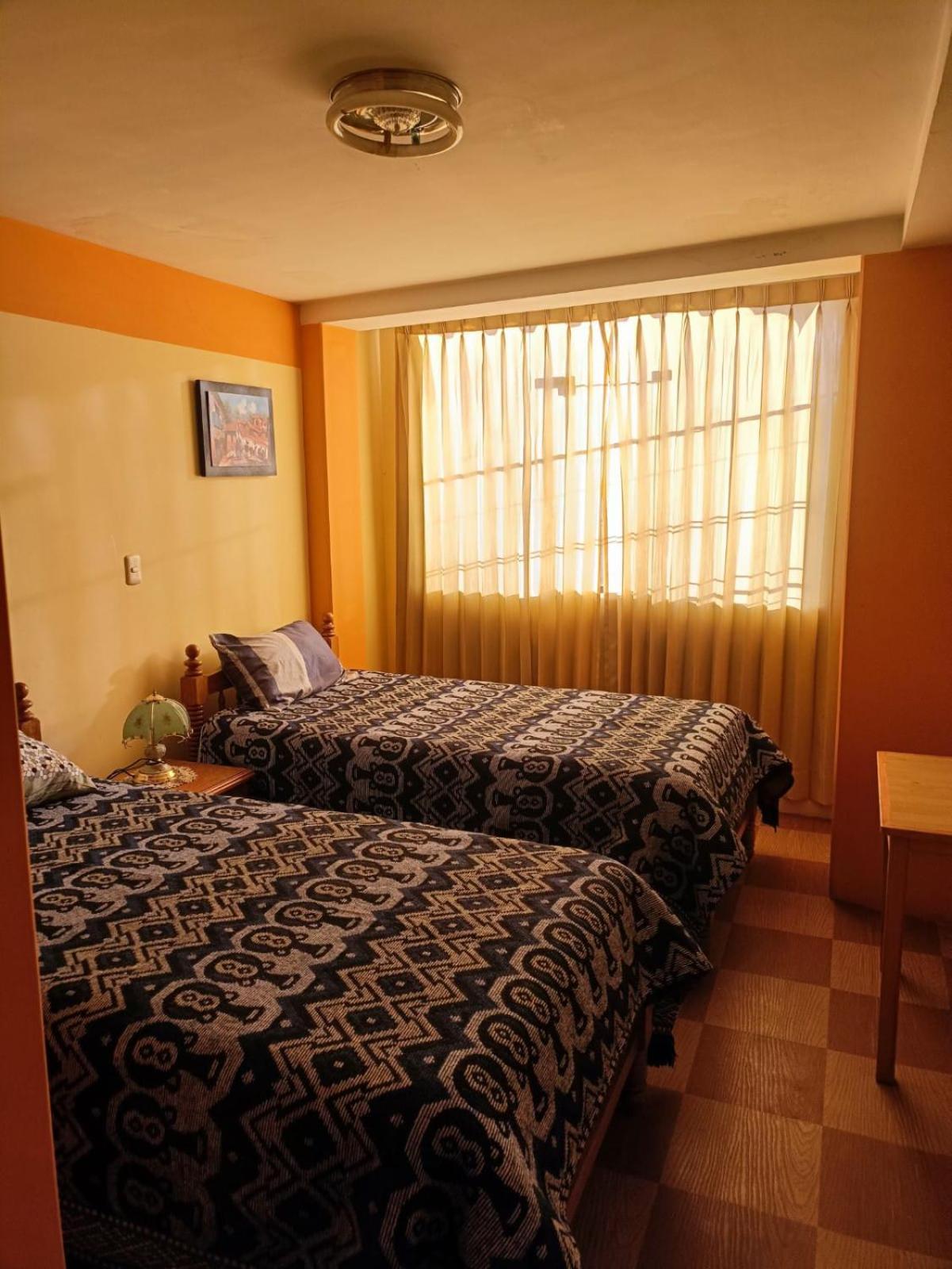 Hostal Vista Al Lago Titicaca Puno Esterno foto