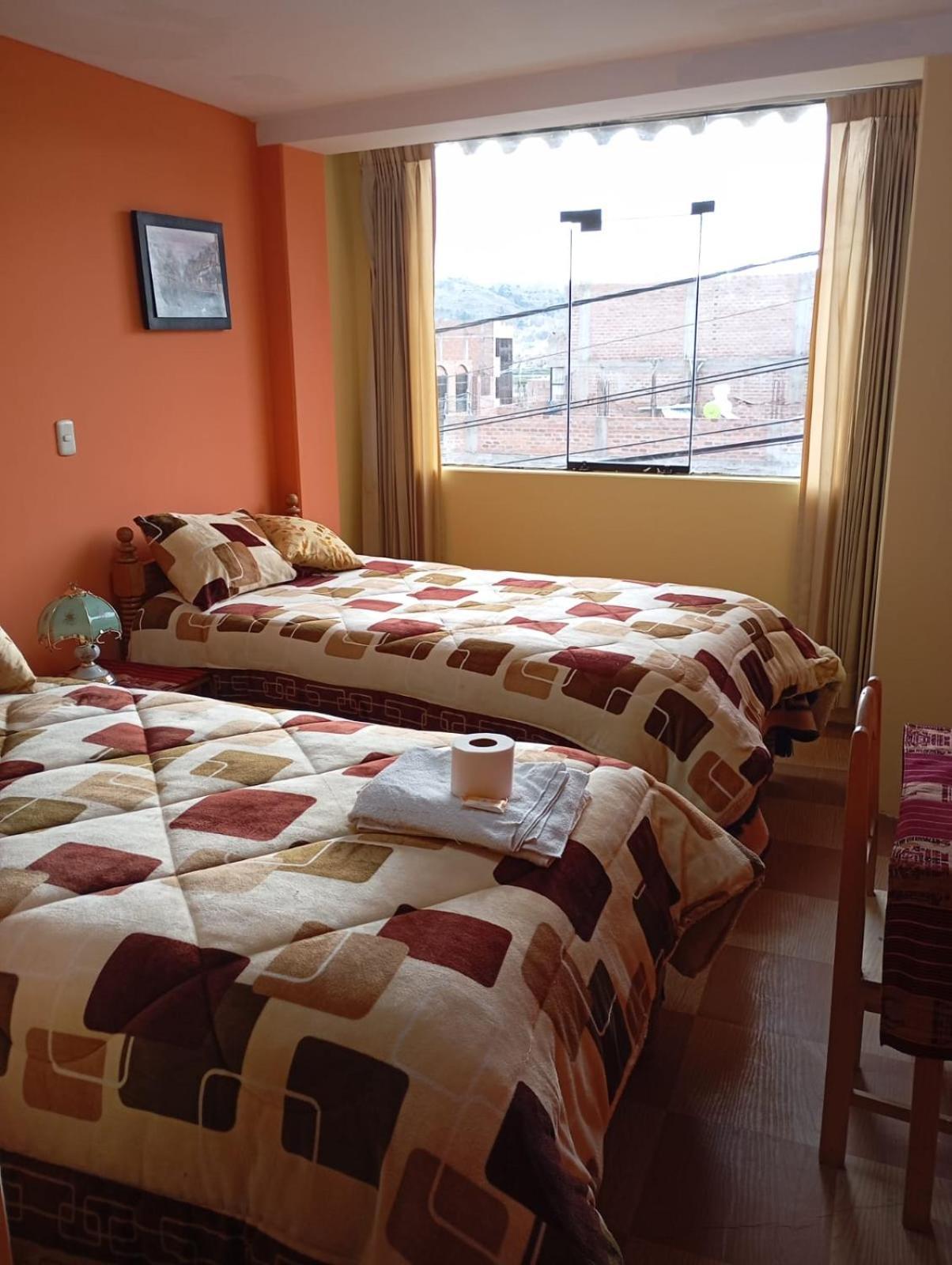 Hostal Vista Al Lago Titicaca Puno Esterno foto