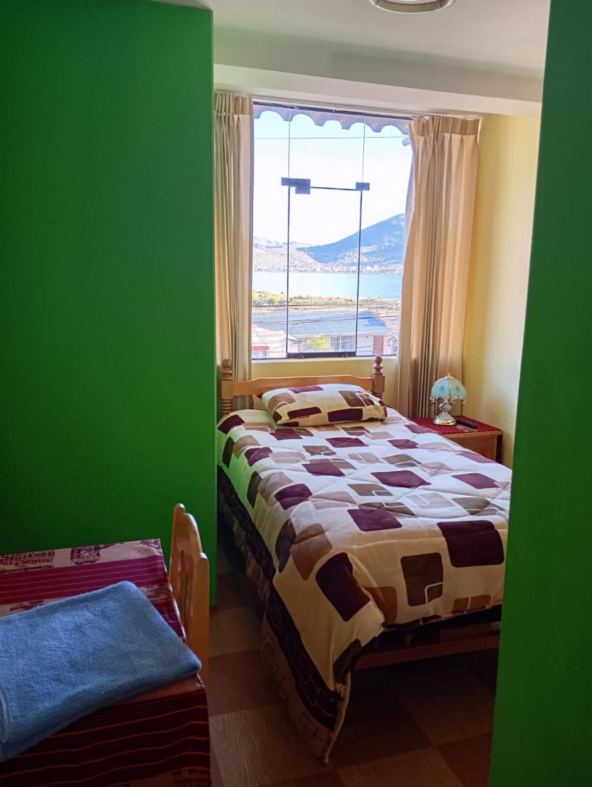 Hostal Vista Al Lago Titicaca Puno Esterno foto