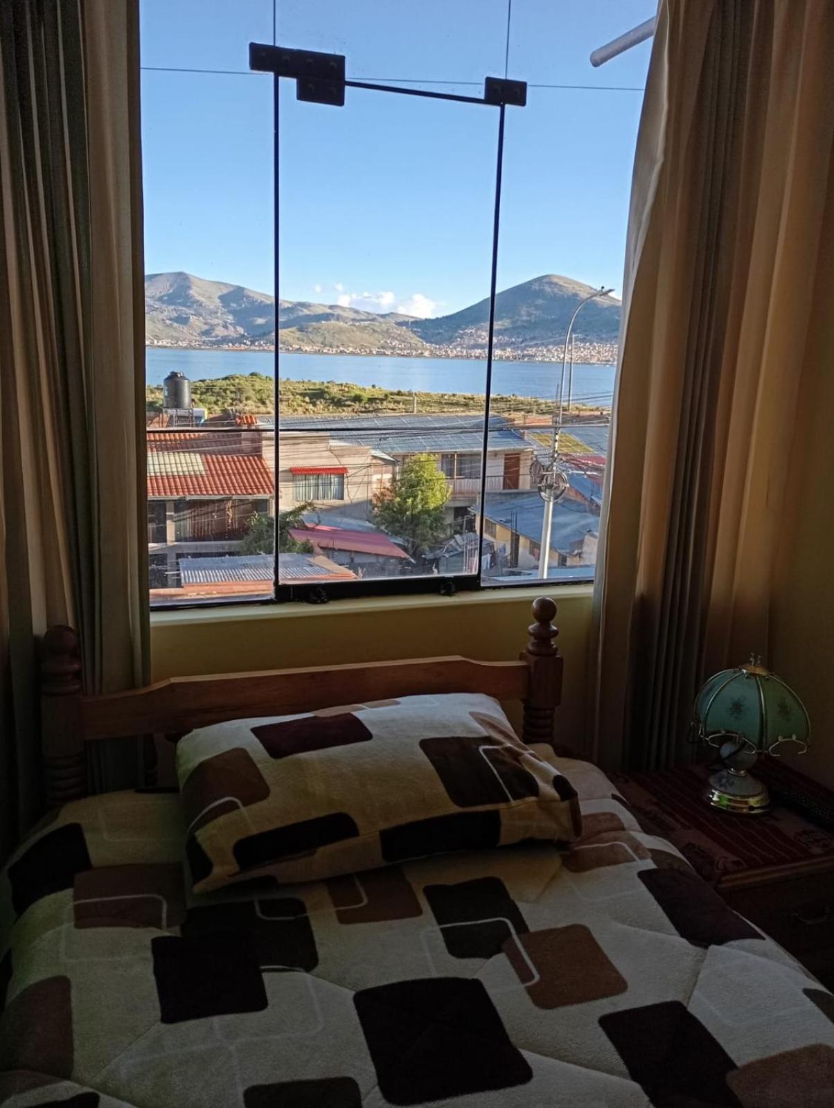 Hostal Vista Al Lago Titicaca Puno Esterno foto
